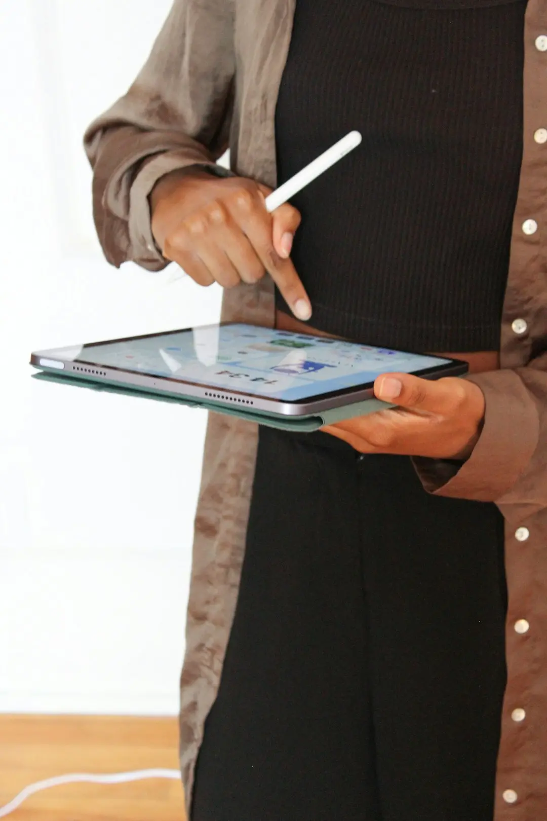 5 Gadgets That Quietly Make Your Day More Efficient 5 Woman using a tablet device — modern tech use