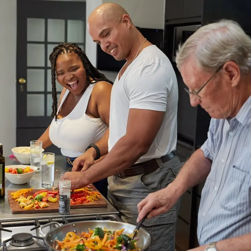 The Ultimate Meal Prep Guide for Busy Households 2 Fresh vegetables being chopped on a wooden cutting board
